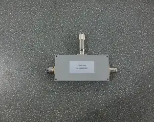 What are the key factors affecting the power handling capacity of a coaxial variable attenuator?
